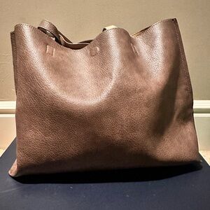 Reversible faux leather tote and wristlet